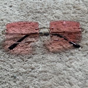 square rimless sunglasses.